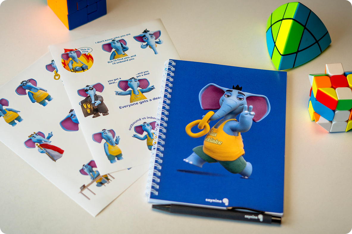 Stickers, pen, and notebook - SayNine merch